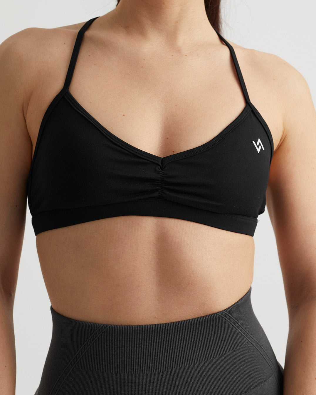 Top fruncido negro multiposición deportivo