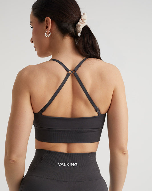 Top gris deportivo para mujer espalda cruzada