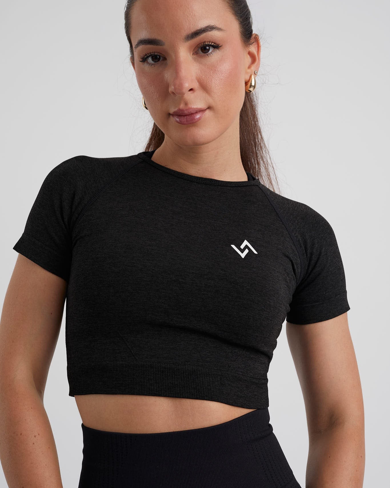 top negro deportivo manga corta