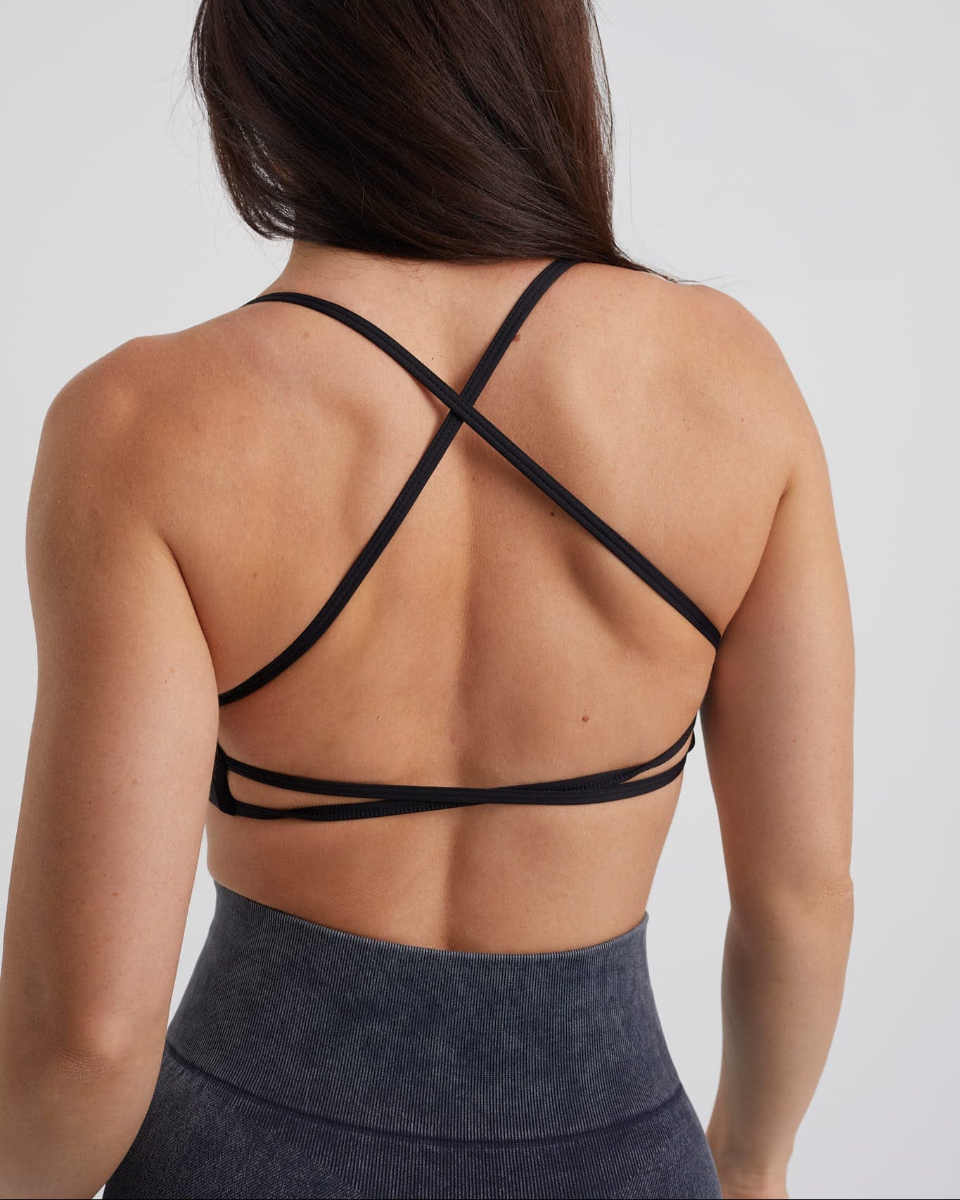 top negro espalda cruzada sujecion media para mujer