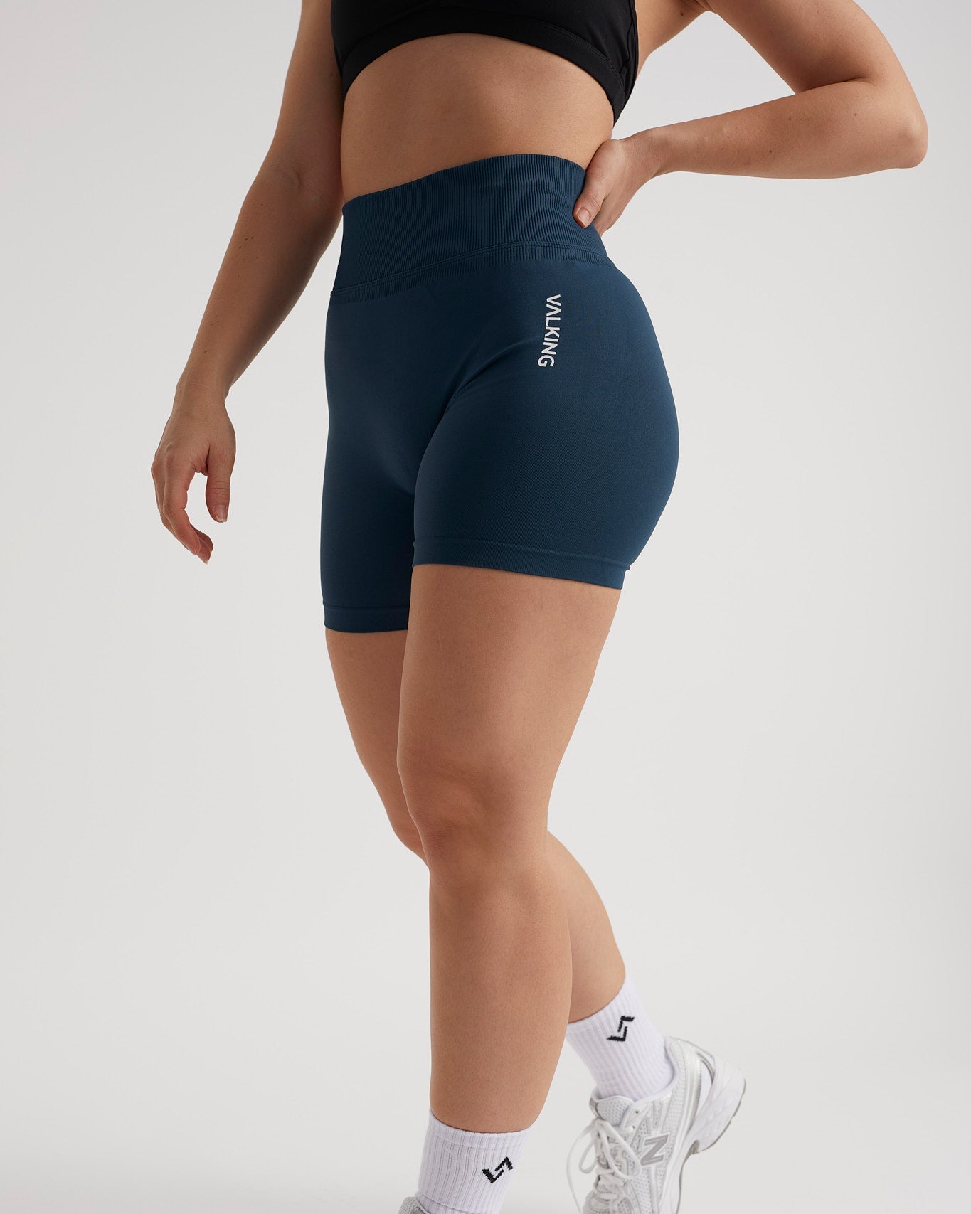 Shorts deportivos efecto compresivo para mujer