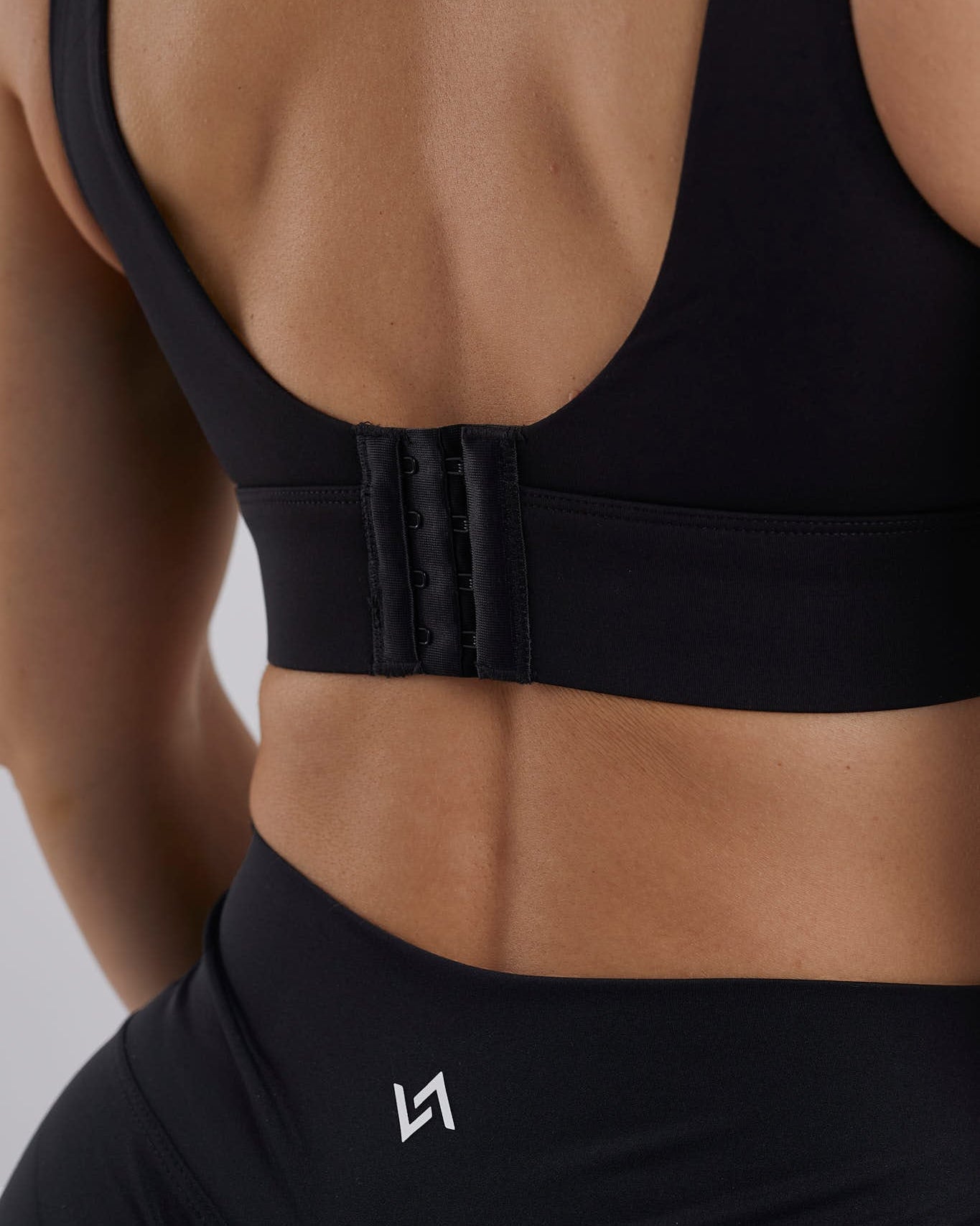 Sujetador deportivo negro cierre evilla