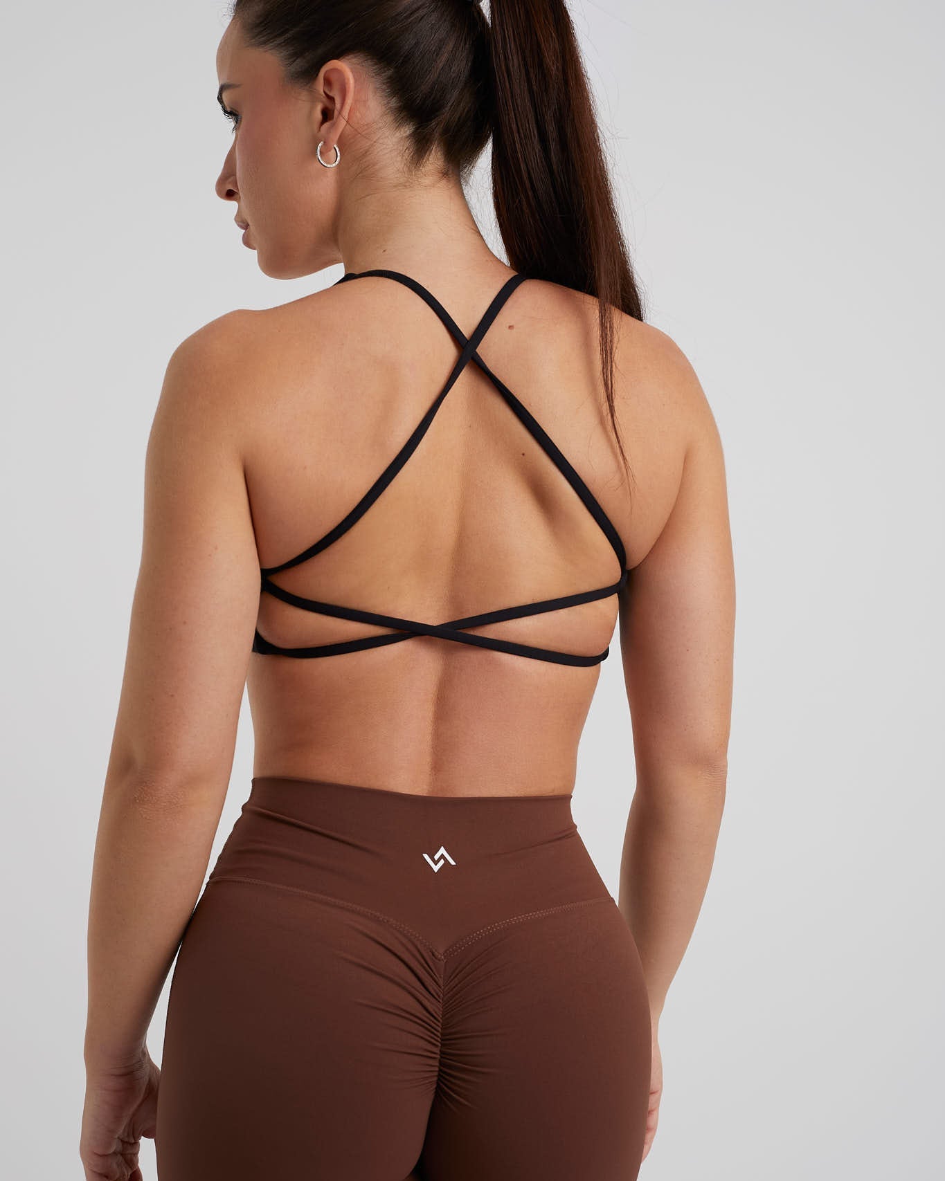 Top deportivo espalda cruzada mujer