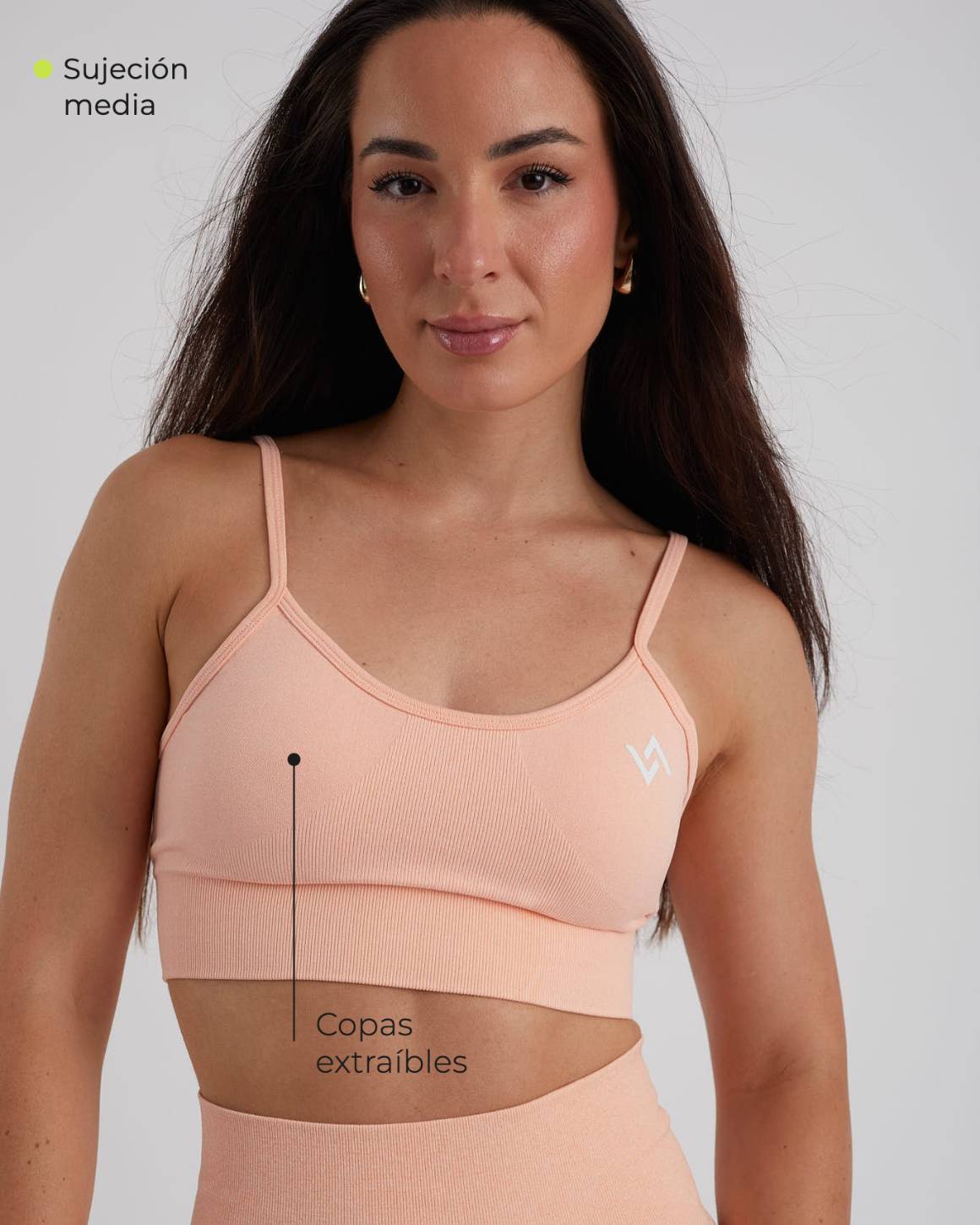 Top Core Comfort naranja con copas extraíbles y sujeción media